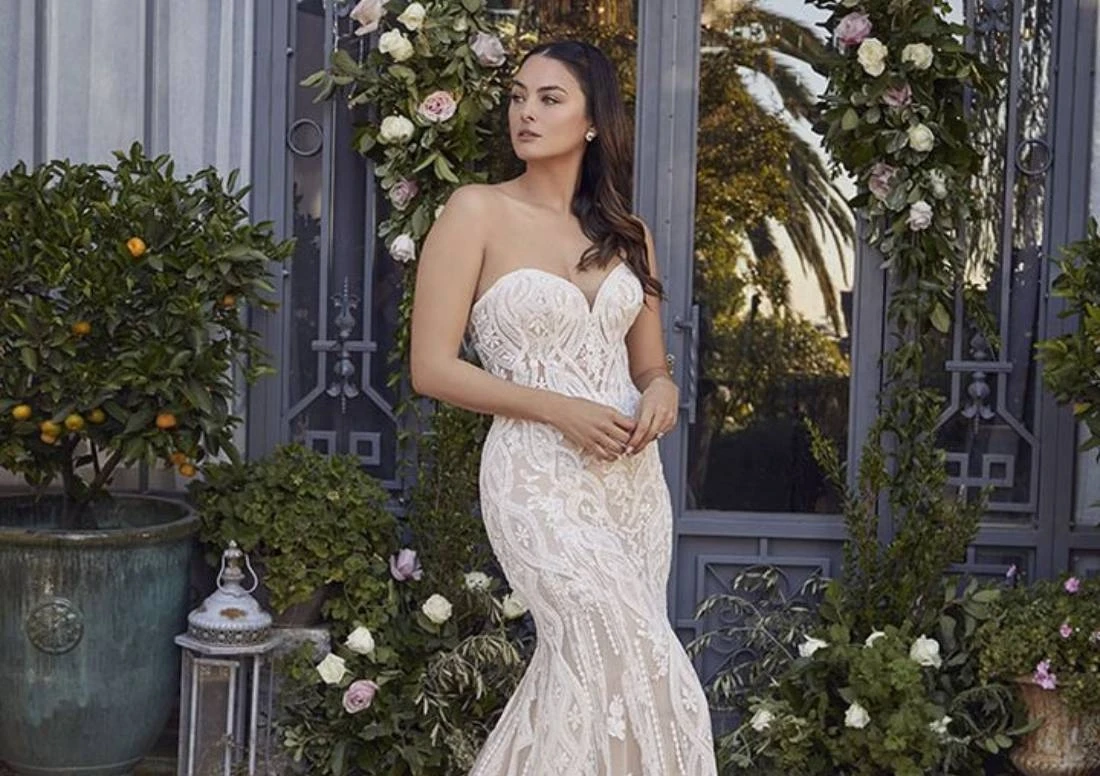 Photo of the model wearing a bridal gown